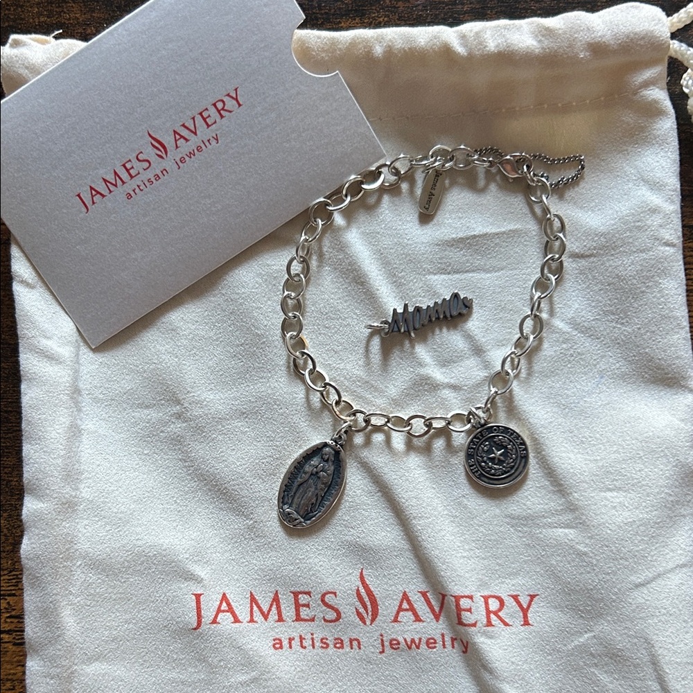 James Avery Silver Charm Bracelet with 3 charms.